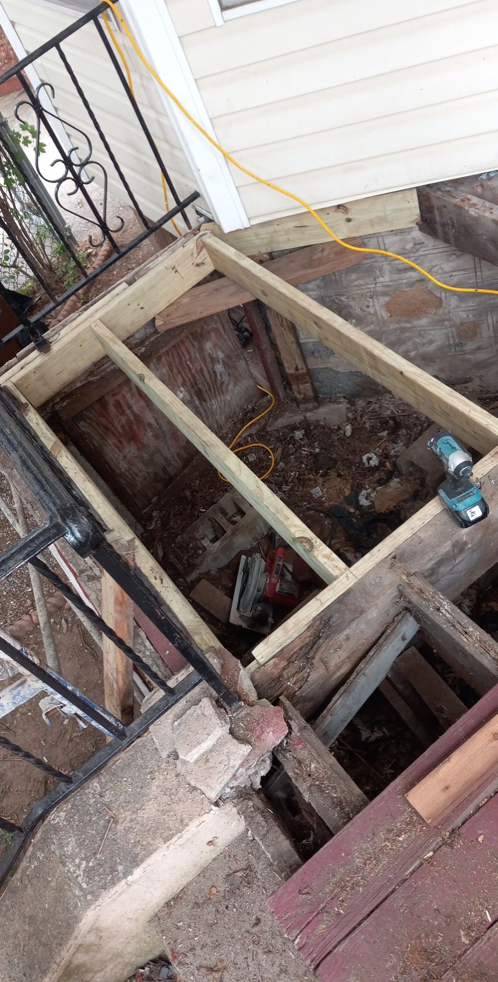 removed rotten wood restructures the frame then in