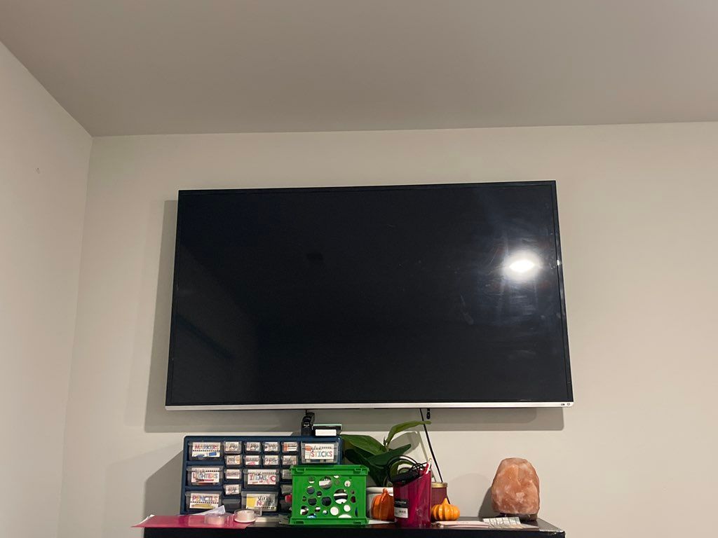 55inch Tv I mount for a client in her business are