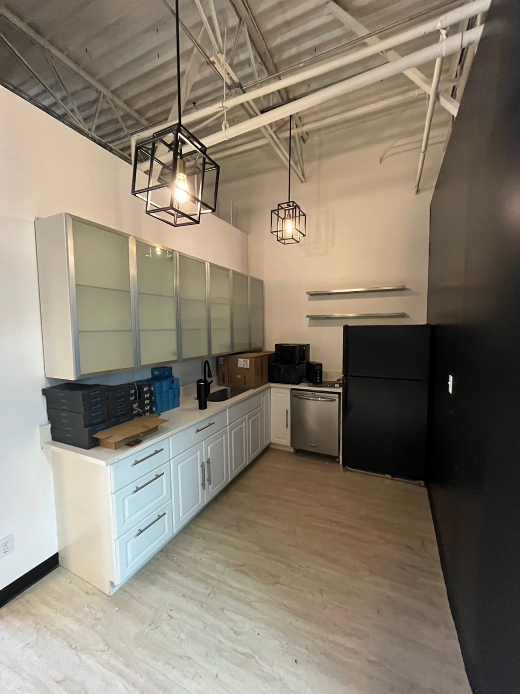 Installed kitchen cabinets & shelves + painted