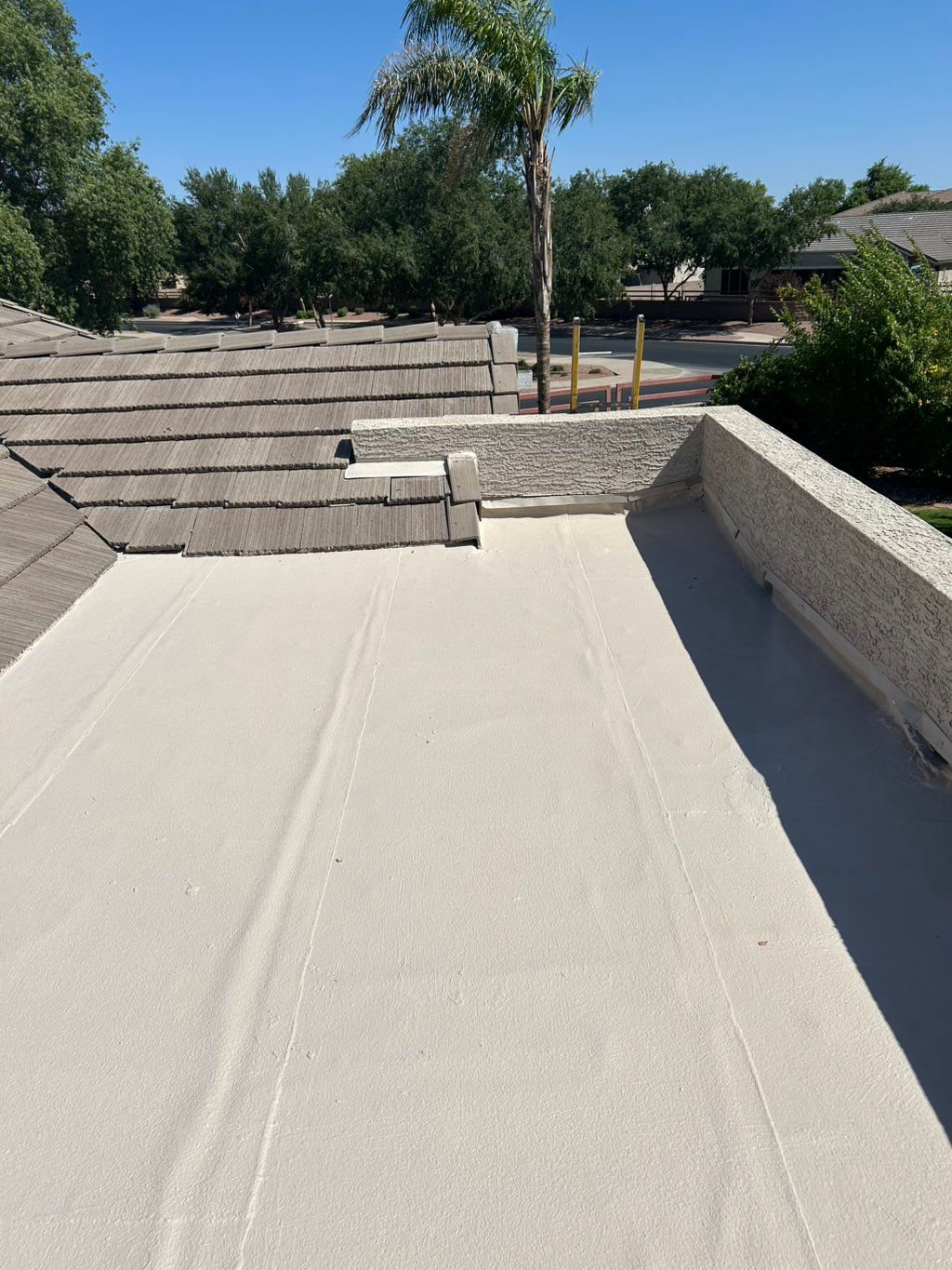 After - Elastomeric Roof Coating 