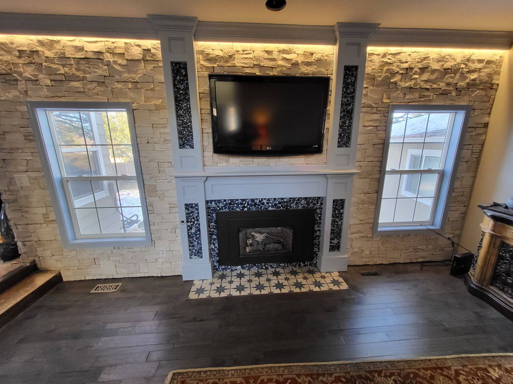 CUSTOM FIREPLACE,  STONE ACCENT AND DIMMABLE LED