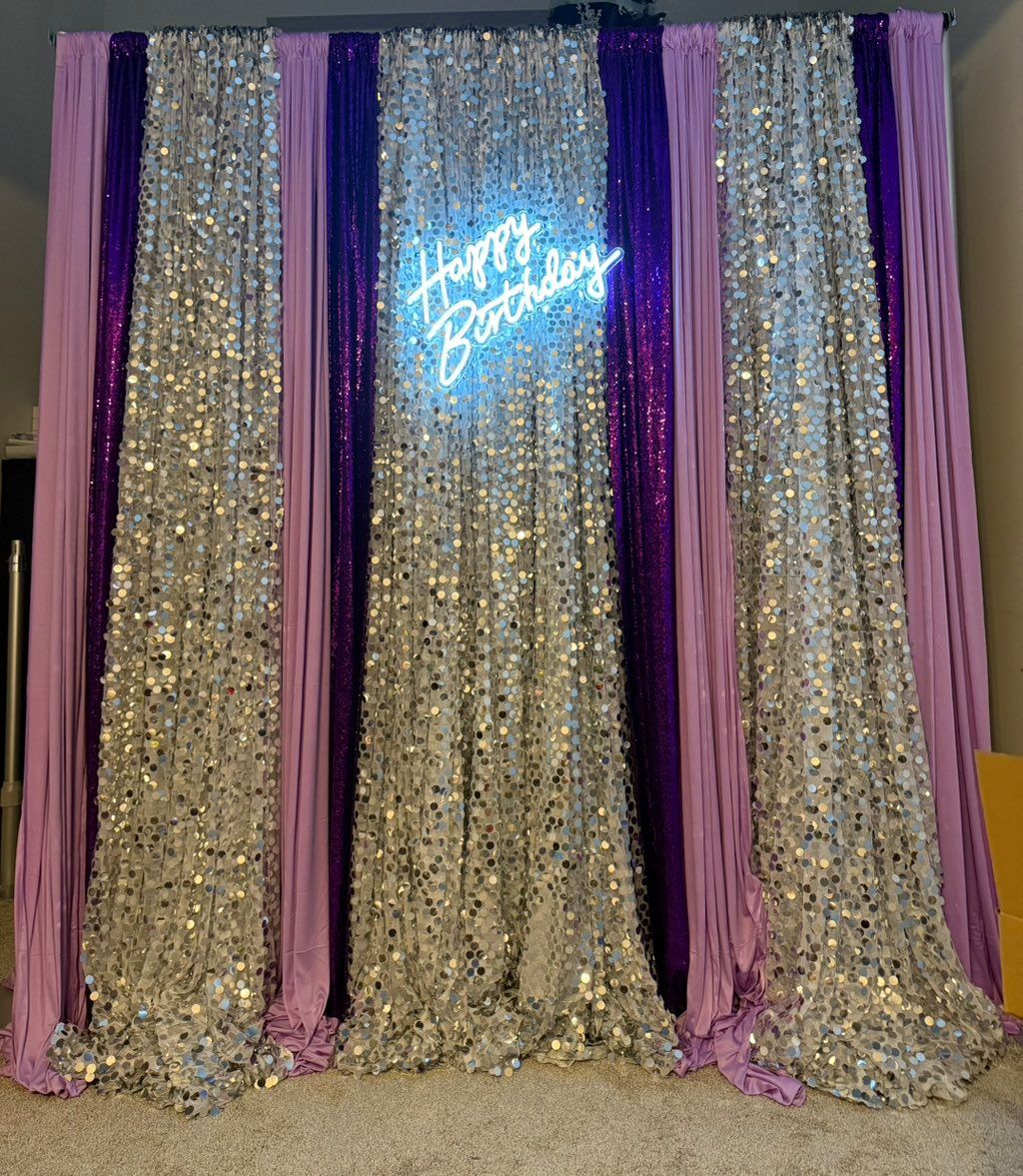 Pipe and drape with neon sign 