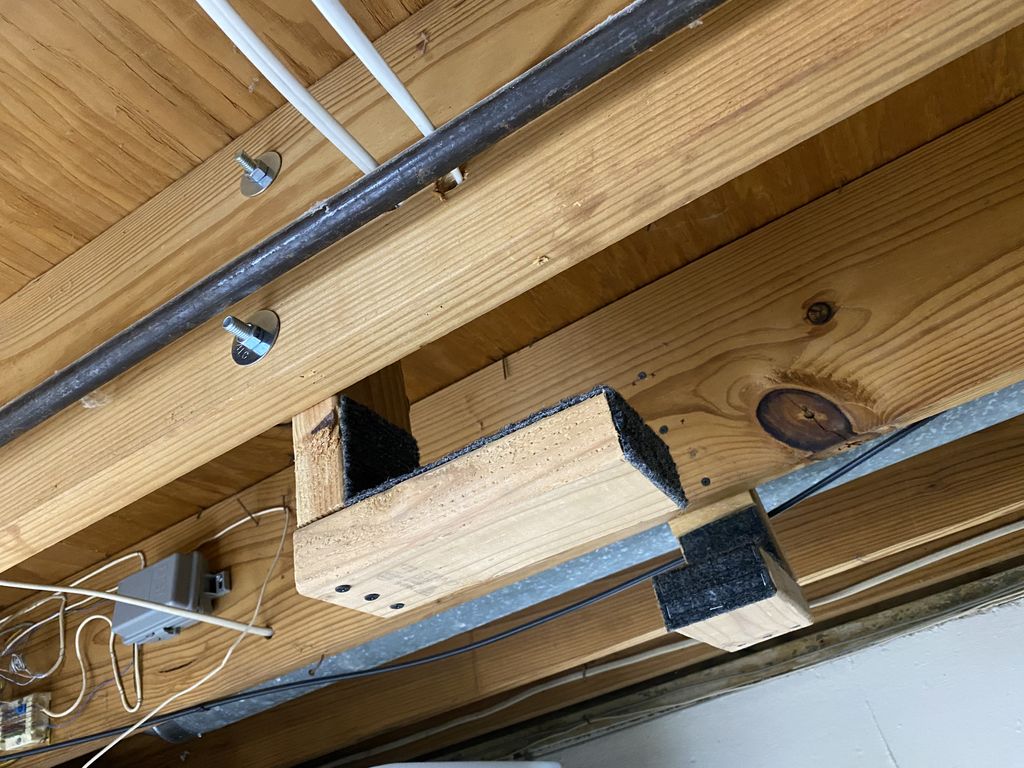 These brackets hold a large table to save space in