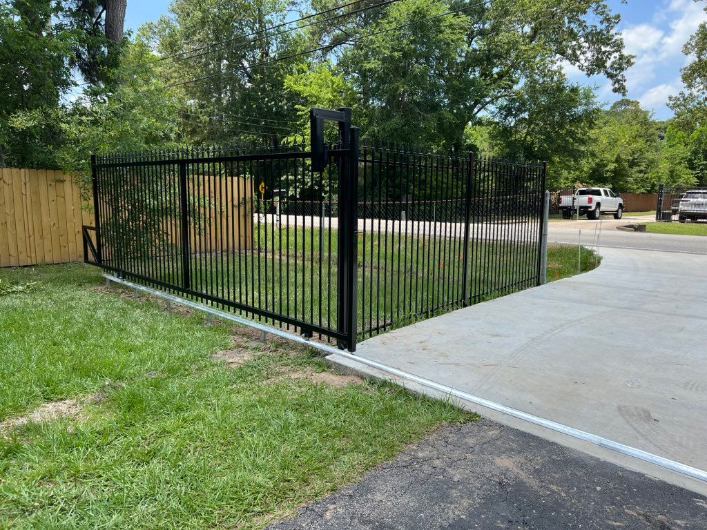 Custom iron v-track gate 