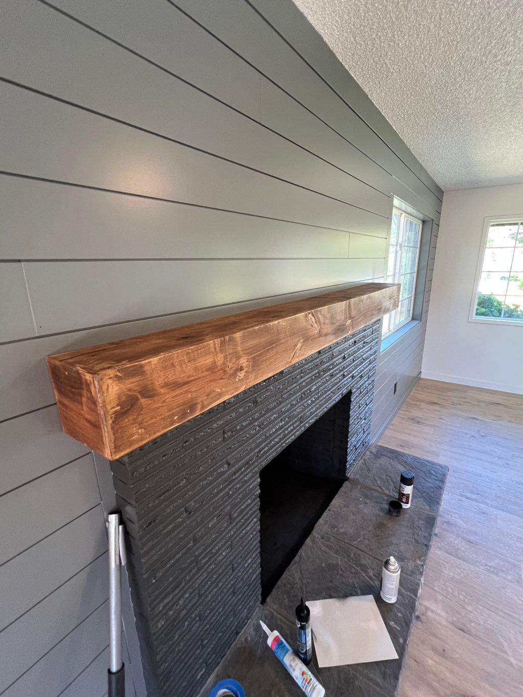 A distressed beam mantle