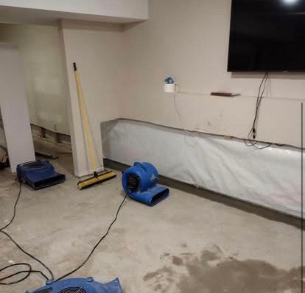 The final stages of a basement waterproofing job