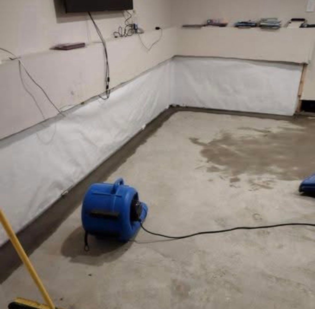 The final stages of a basement waterproofing job