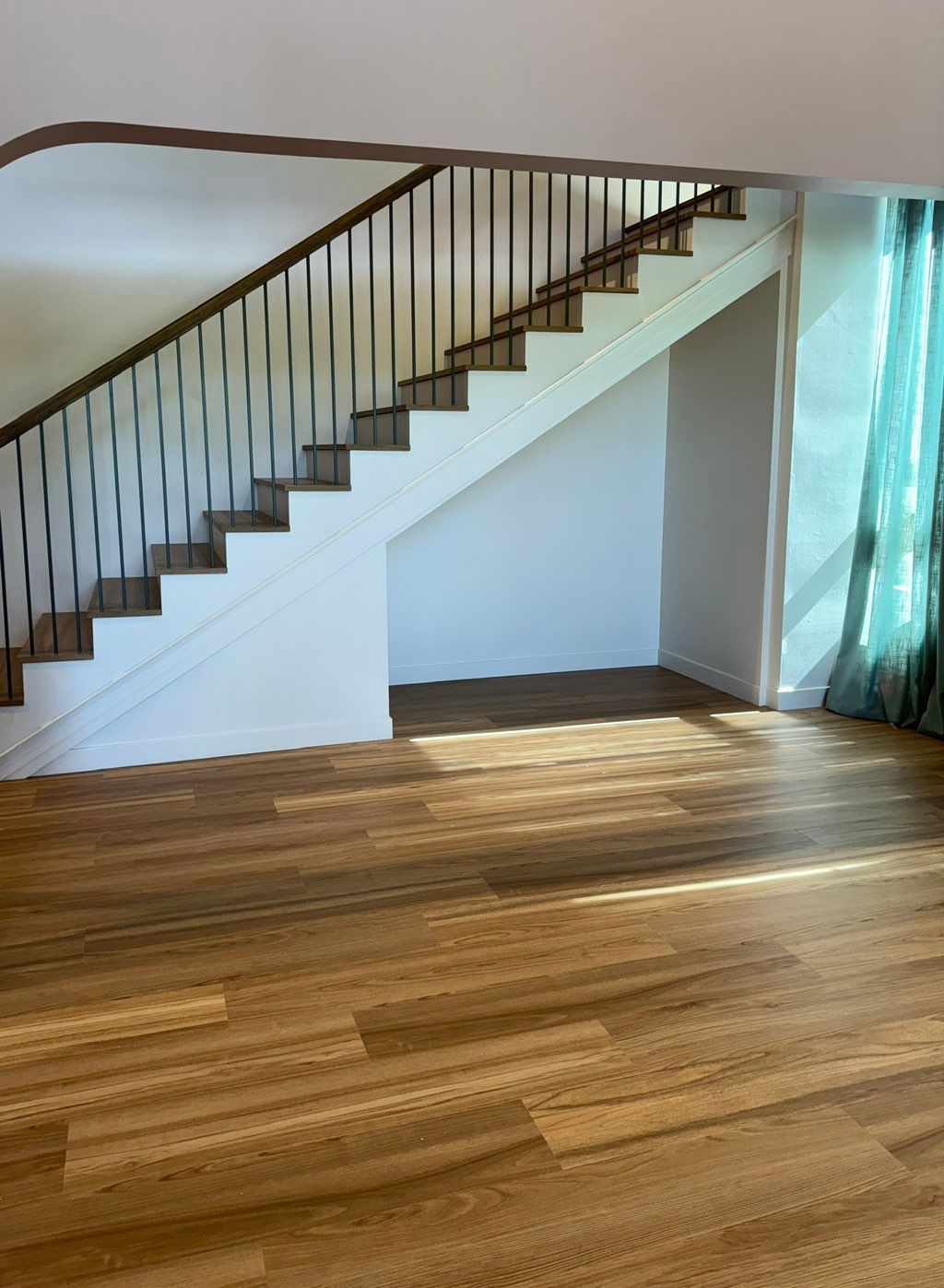 Base board work and trim around stair case and flo