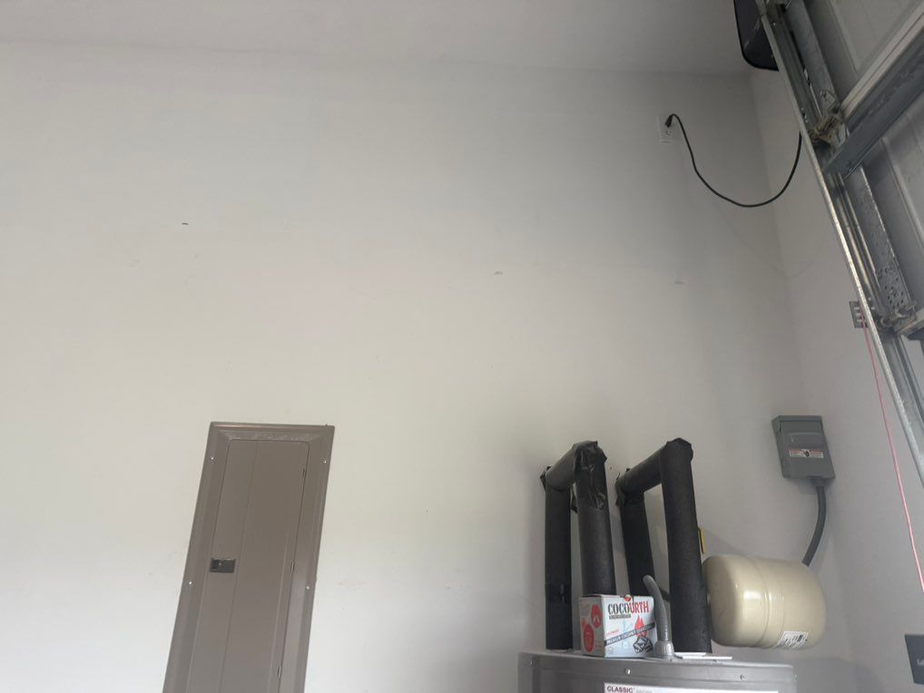 Clean outlet install inside the garage — cut, wire