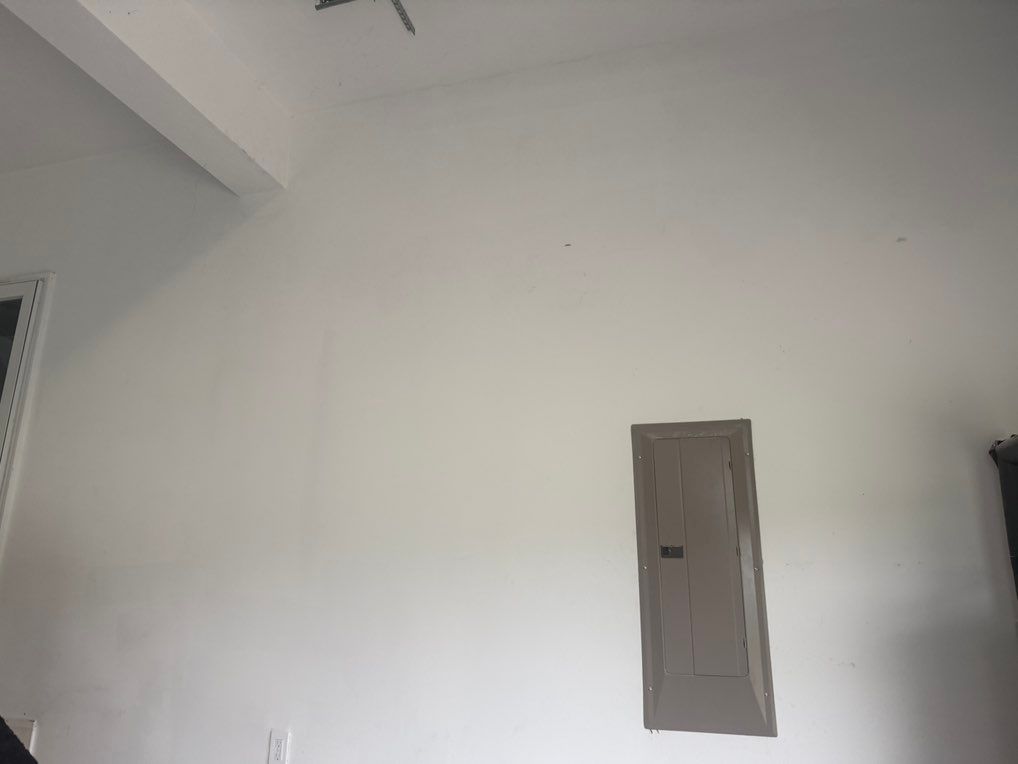 Clean outlet install inside the garage — cut, wire