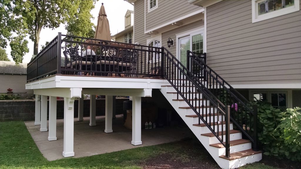 Elevated deck remodel with staircase and custom ir