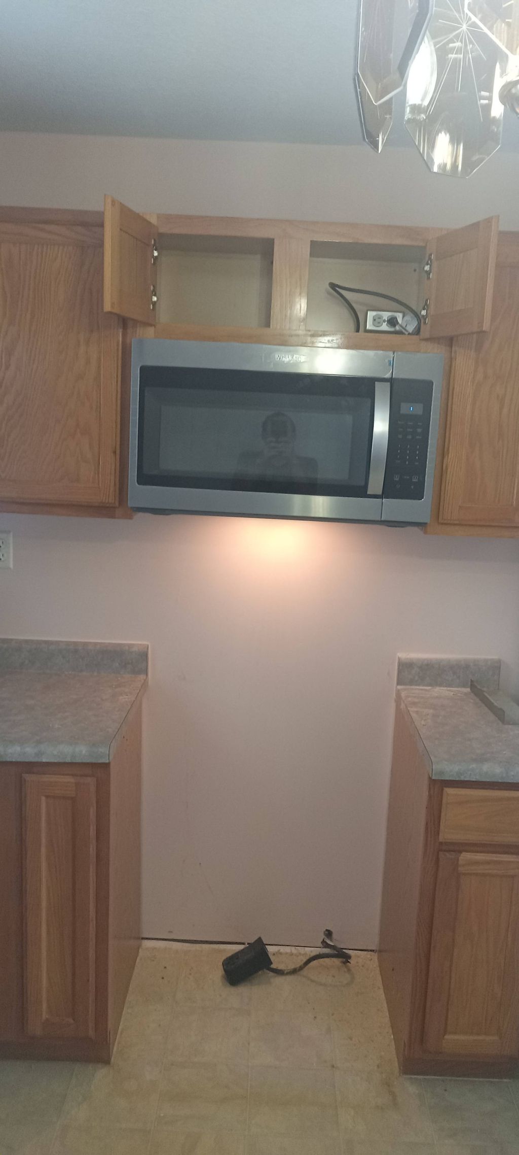 install new microwave and outlet 