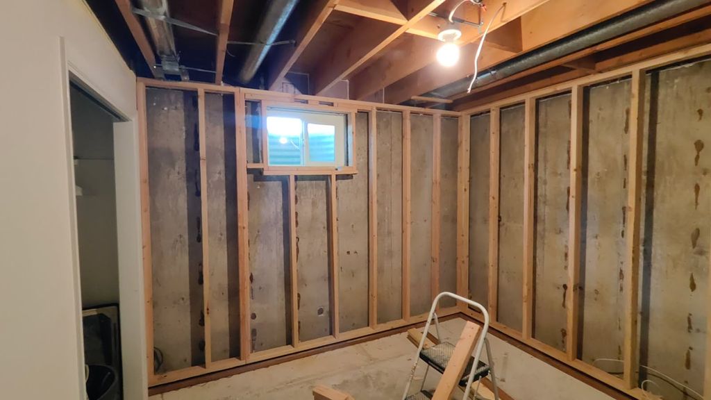 Basement wall and ceiling DURING