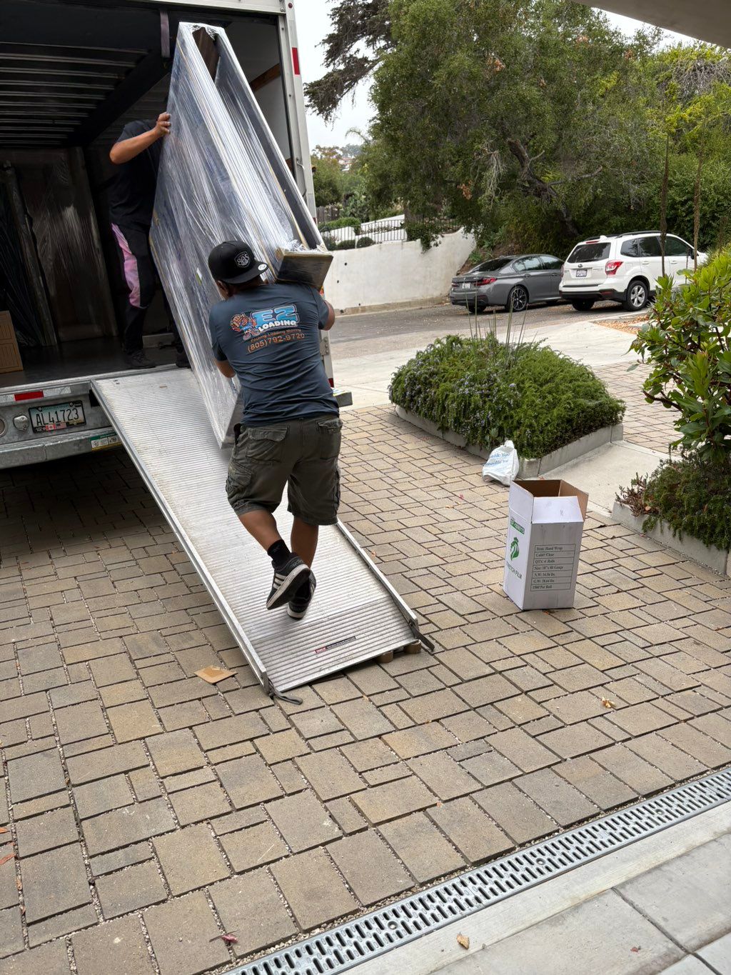 Julian and Miguel loading headboard 