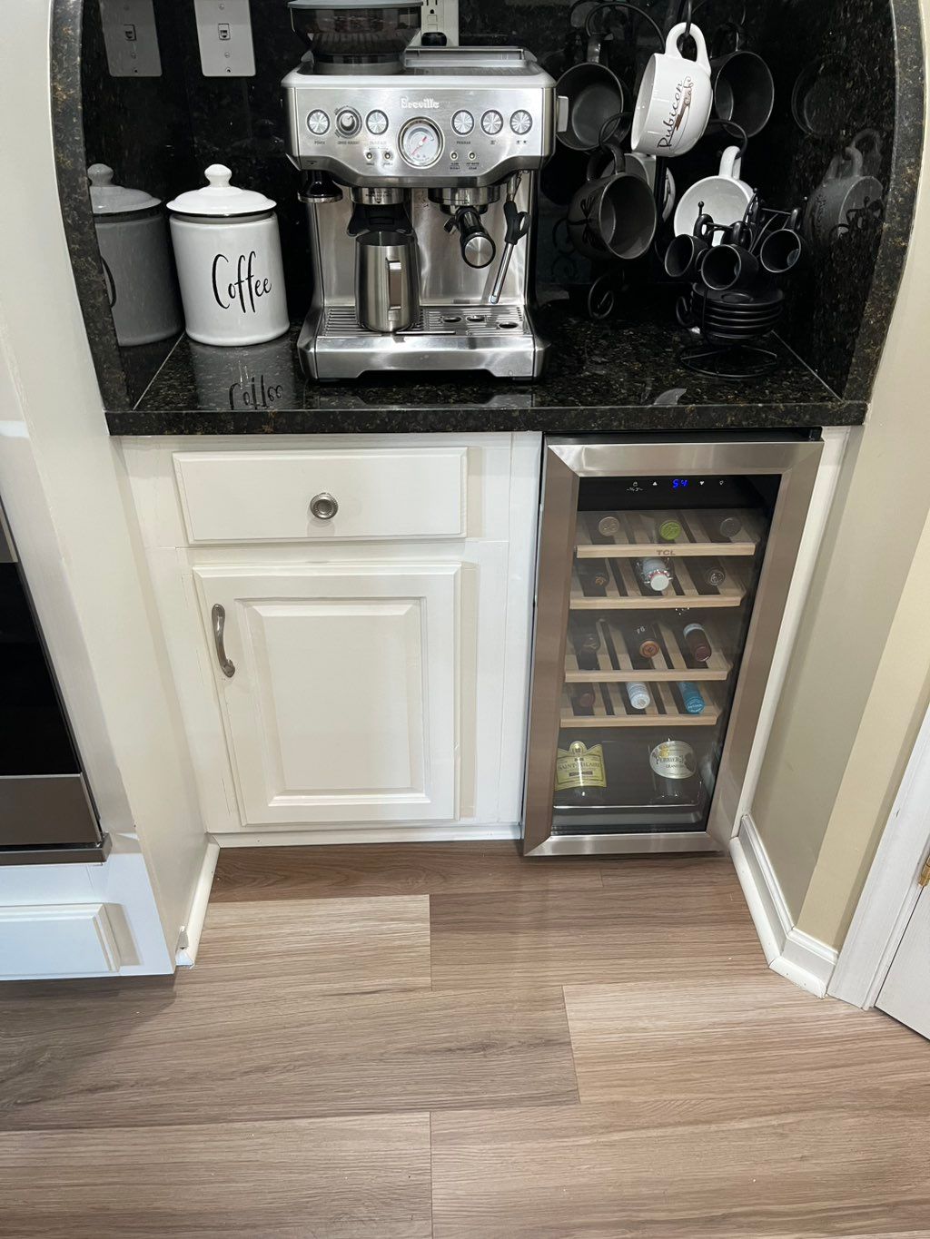 We Custom built a cabinet to fit the area