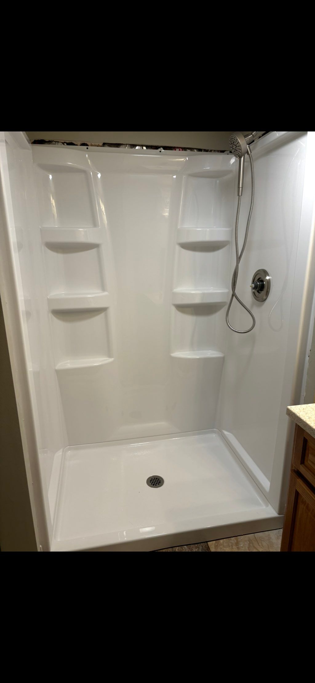 New shower and surround installed