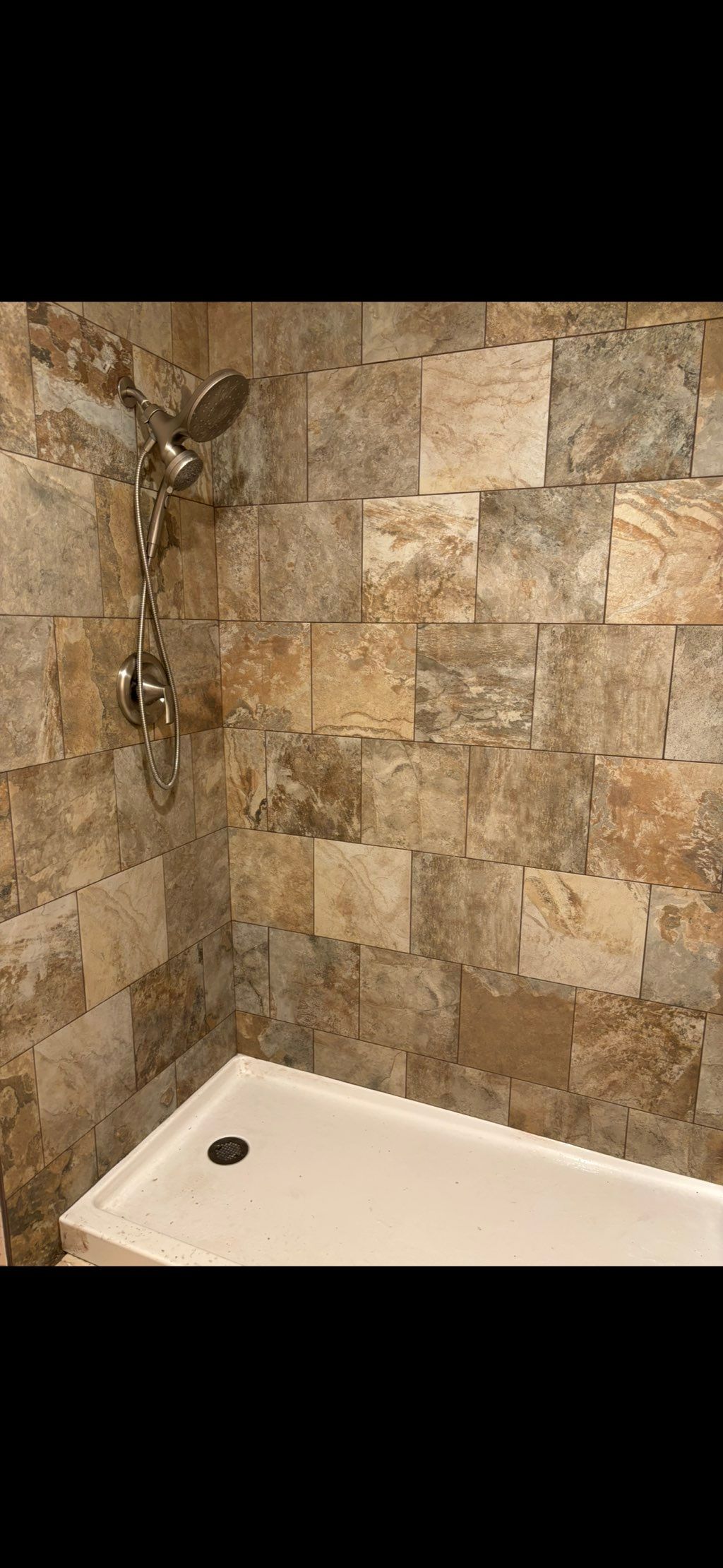 Installed shower pan, and plumbing fixtures 