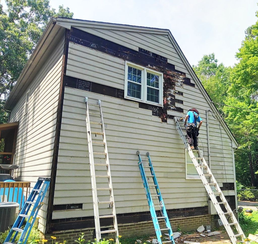 Siding and wood rot repairs.