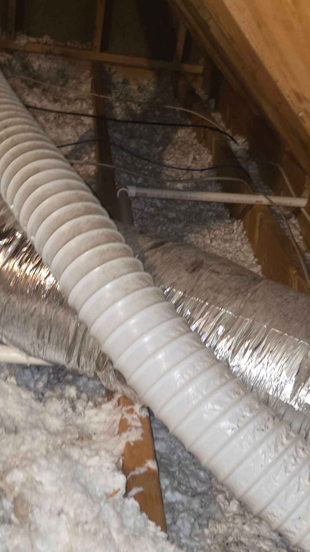 Ductwork with loose-fill insulation, contaminated 