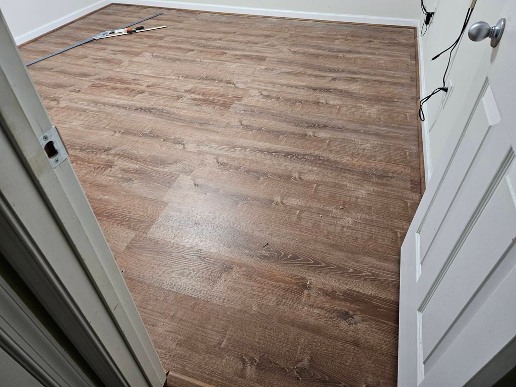 Floor with quarter molding installed