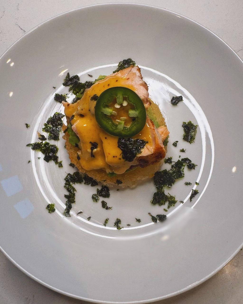 Crispy Rice Salmon over zesty spicy aioli 