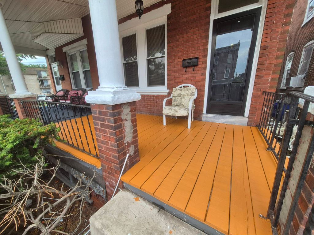 replaced front porch deck boards, stained and seal