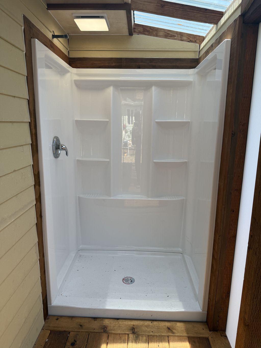 Rebuilt outdoor shower, new siding, deck, cover an