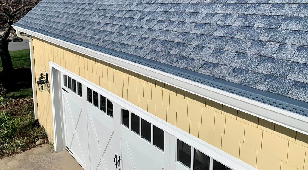 New gutters and gutter protection