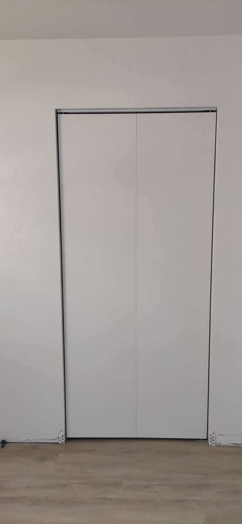 Install closet door 