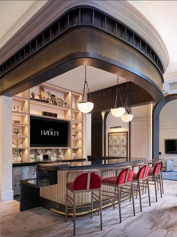 TV mounted behind the bar at the Hadley apartments