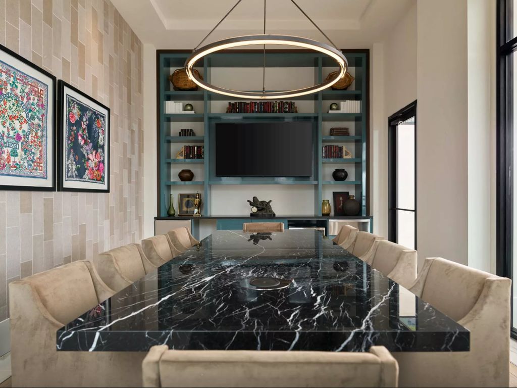 TV mounted in media cabinet inside of a meeting ro