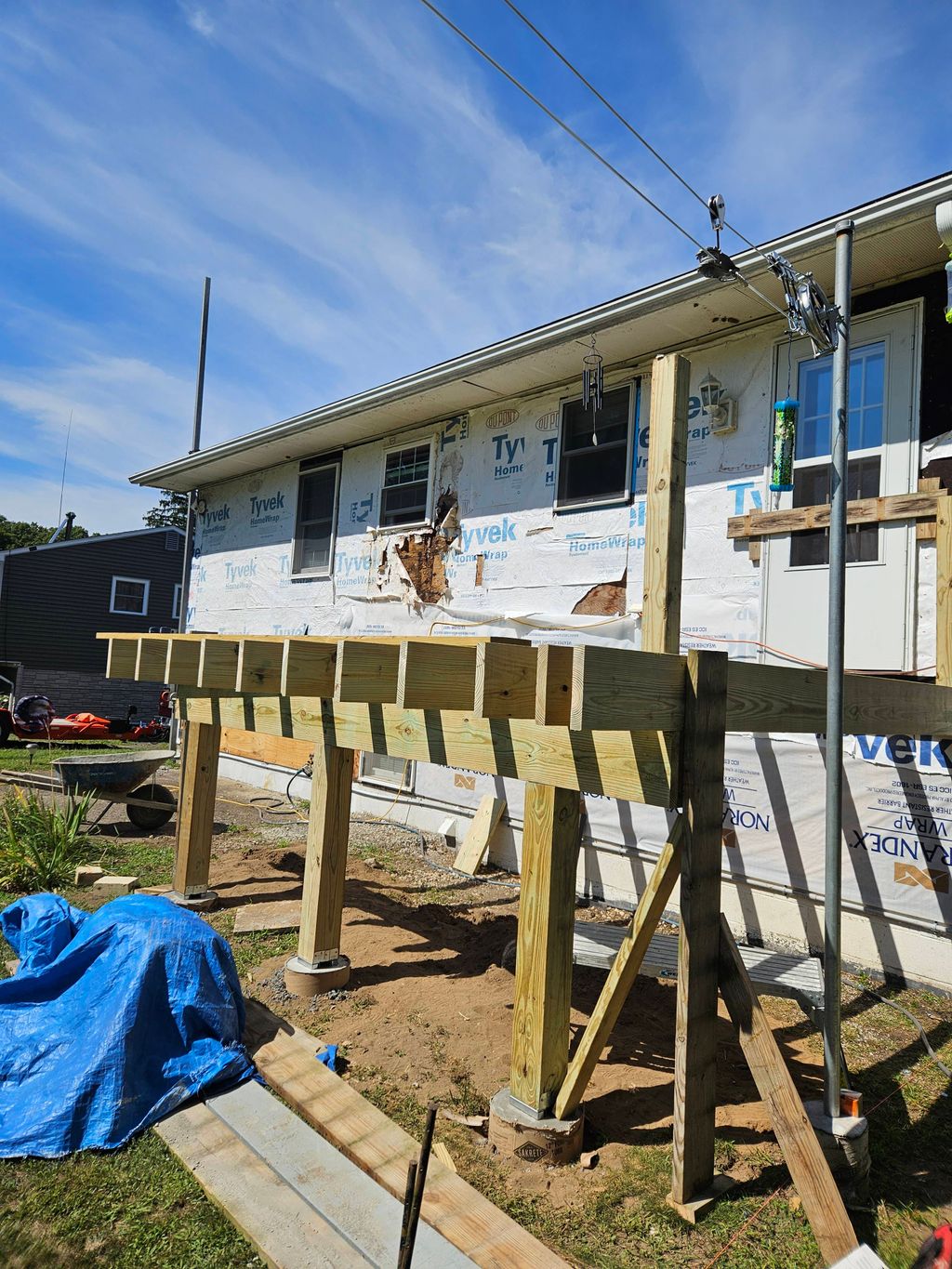 New pressure treated wood deck's frame 