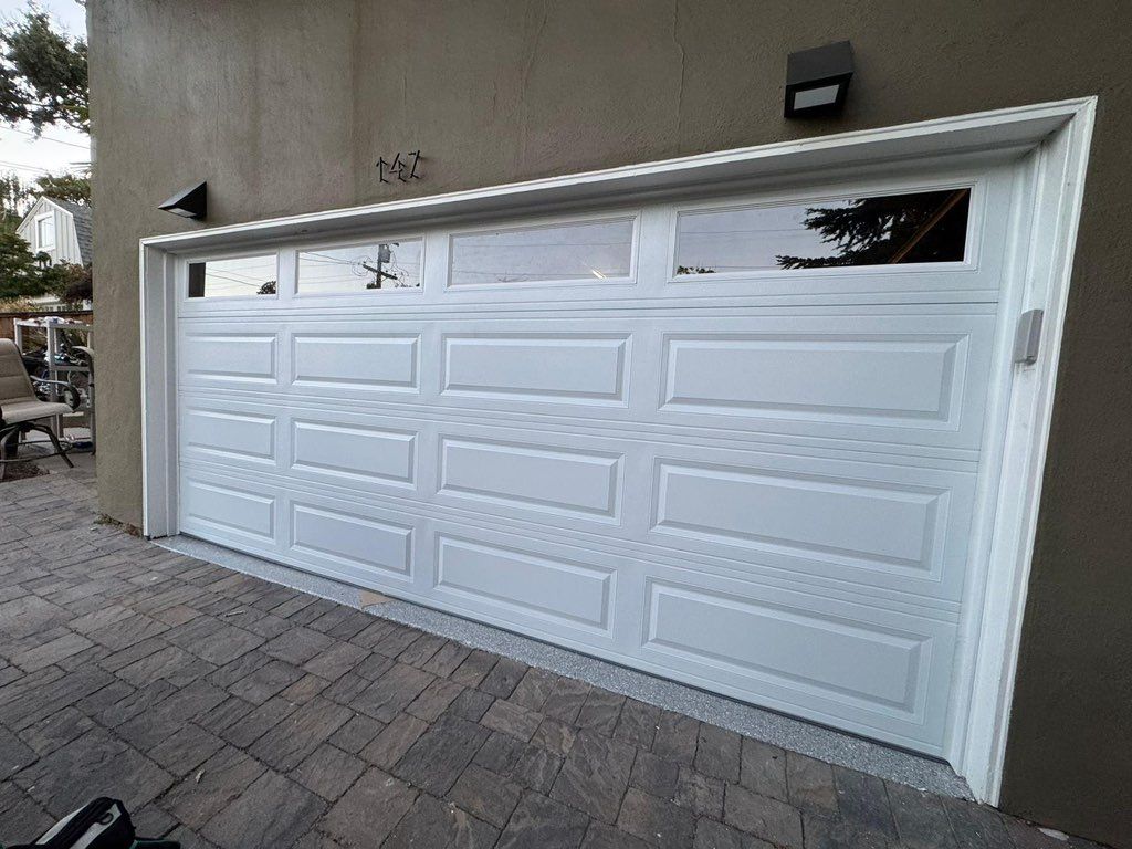 Another white garage door upgrade — bright, stylis