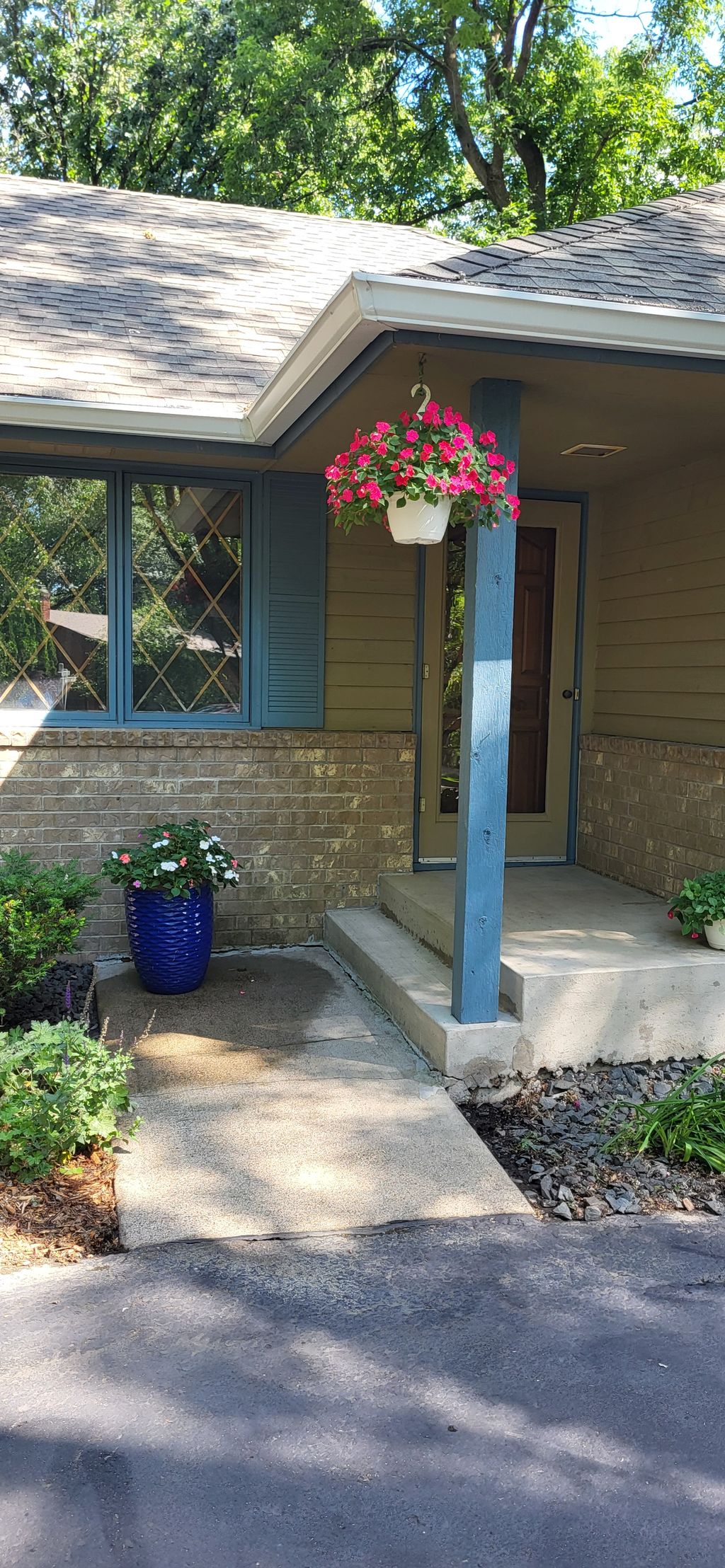 Front Porch and siding pressure washed.