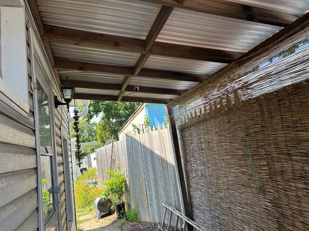 Roof overhang was set over the property line.