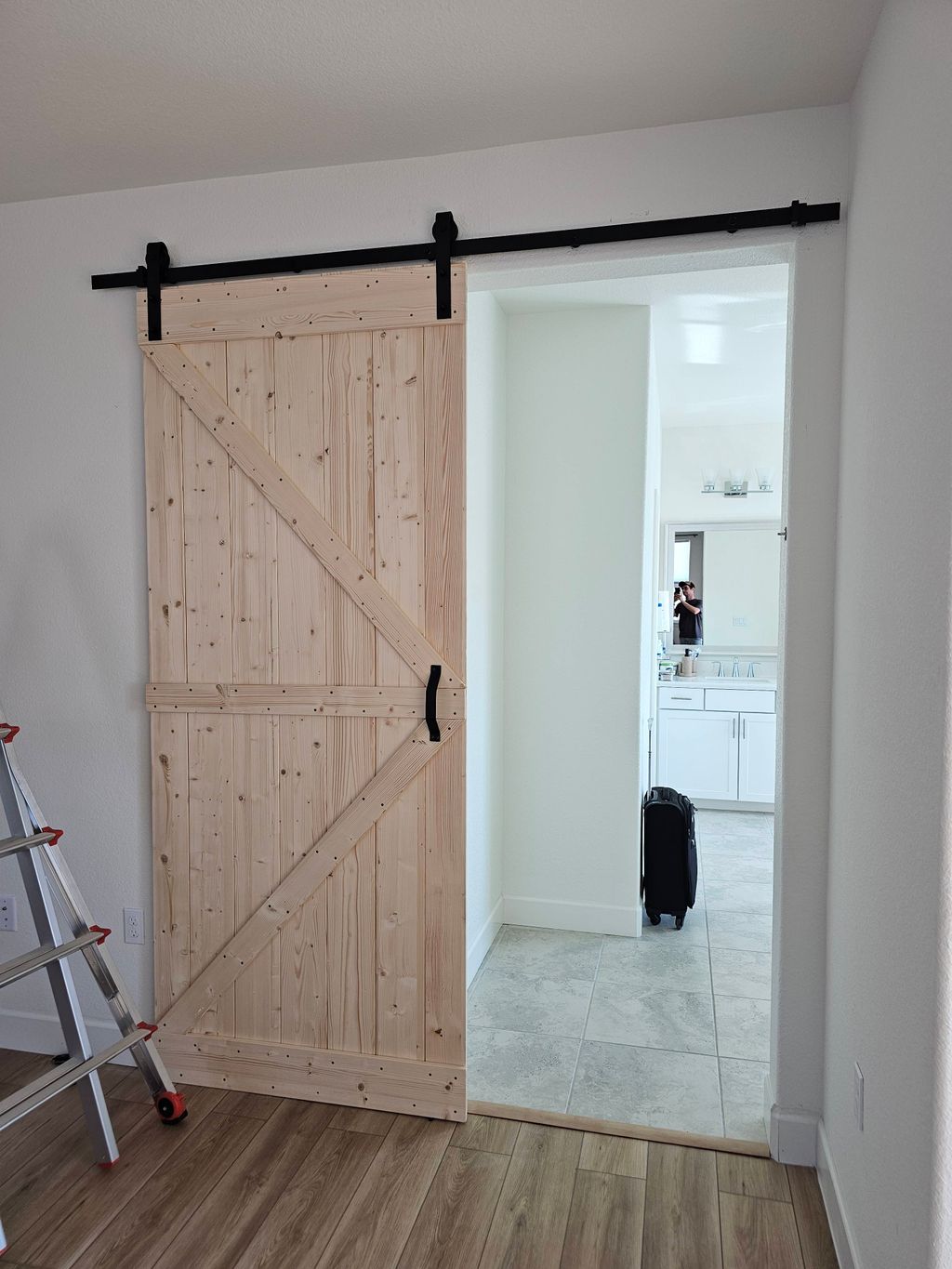 Installation of a barn door.