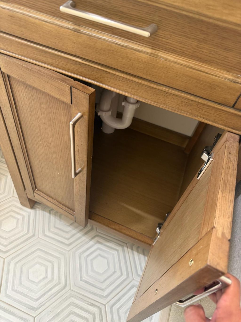 No spot missed! Under cabinets and kitchen sink de