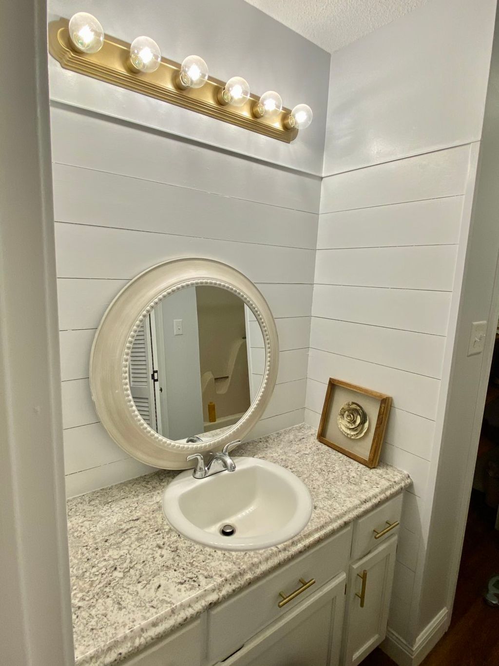 1. New countertop
2. New cabinet hardware 
3. Over