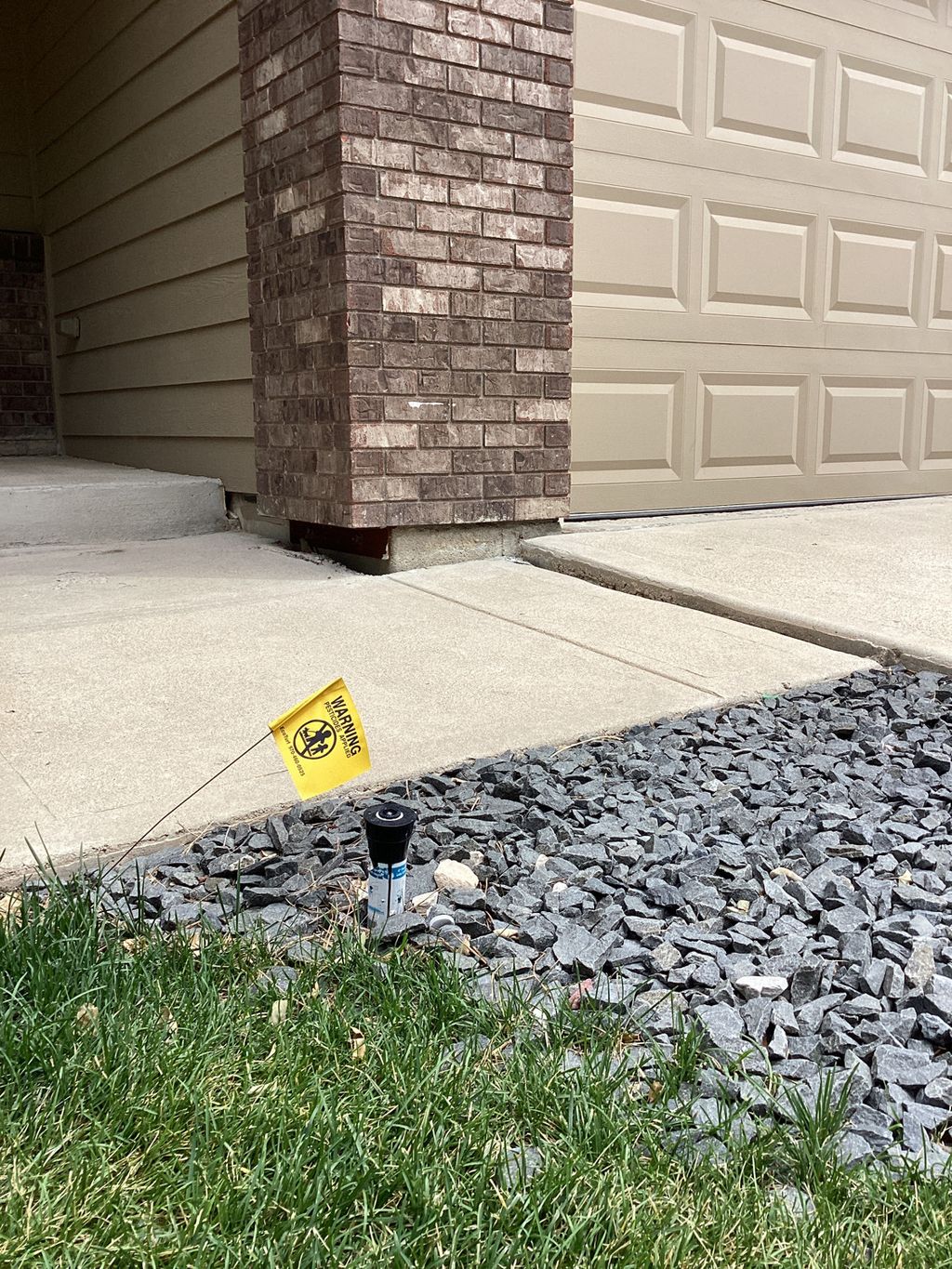 Walkway sank, creating a trip hazard. With  expose