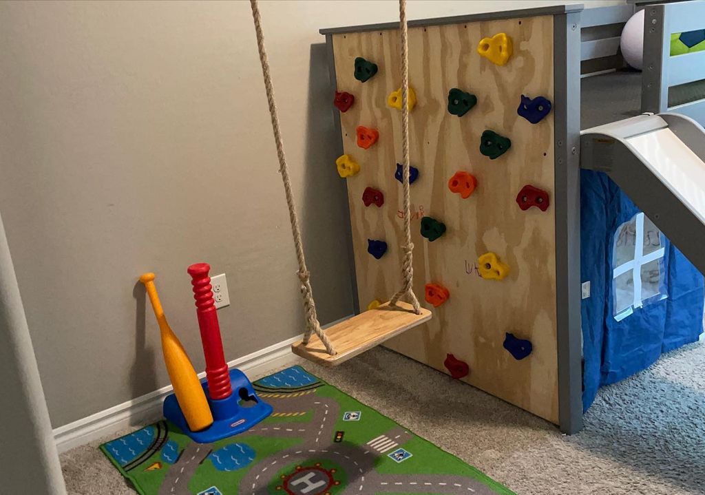 Made this cute little play corner. Climbing wall a