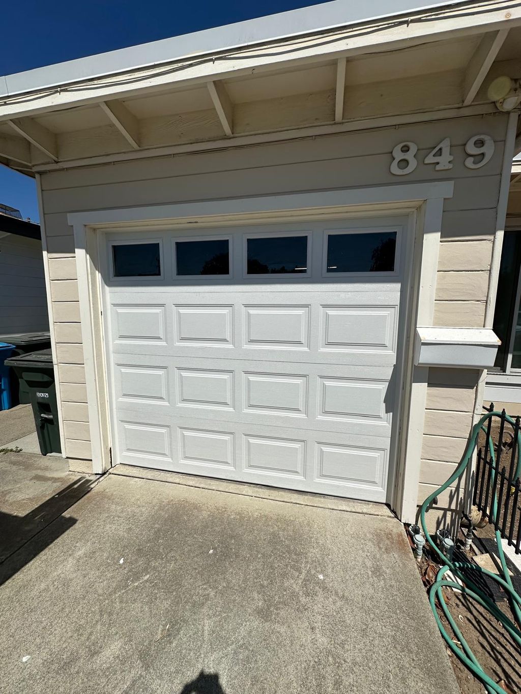 Classic white garage door with top windows for nat