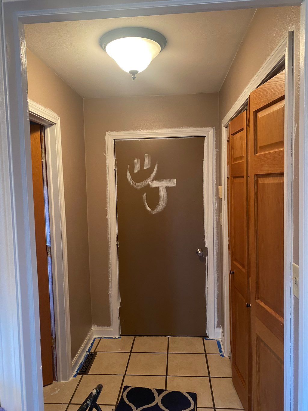 Garage hallway before paint.