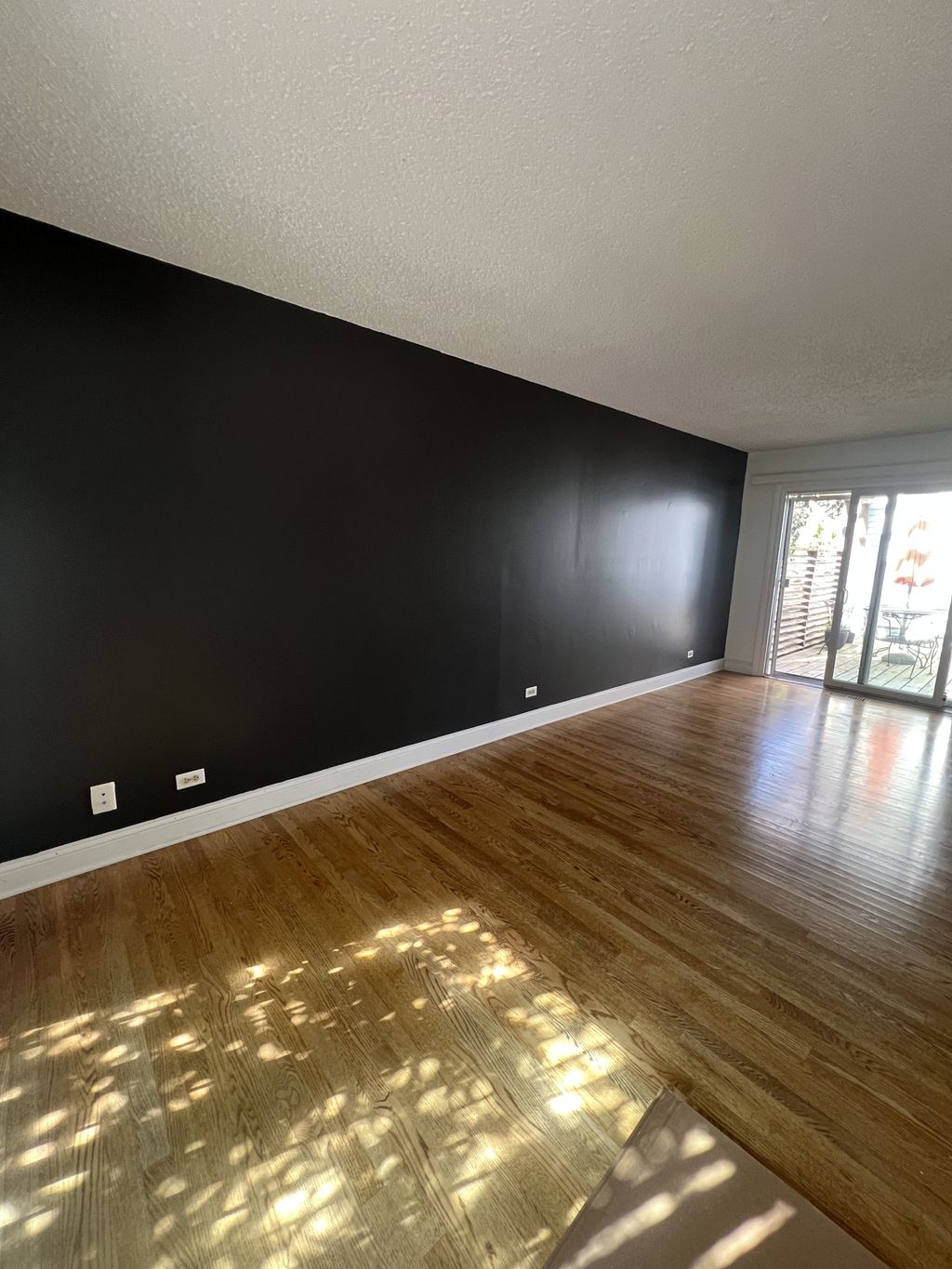 Master bedroom charcoal accent wall