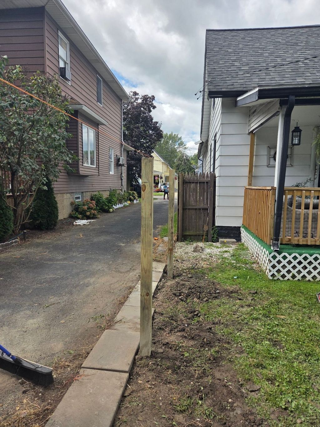 Old posts and concrete removed, new posts set. 