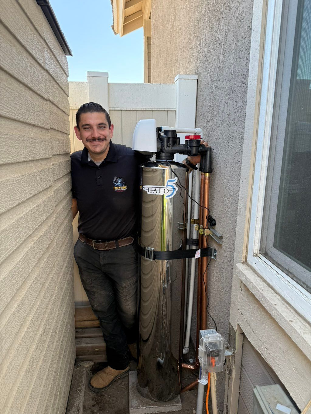 Our team installing a whole home water filtration 