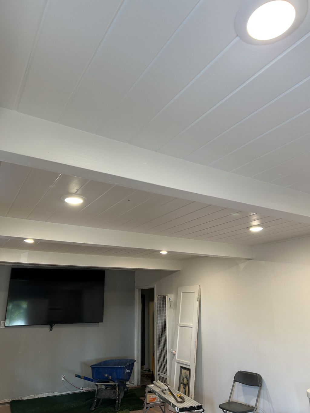 Recessed lights and TV Mounted on wall
