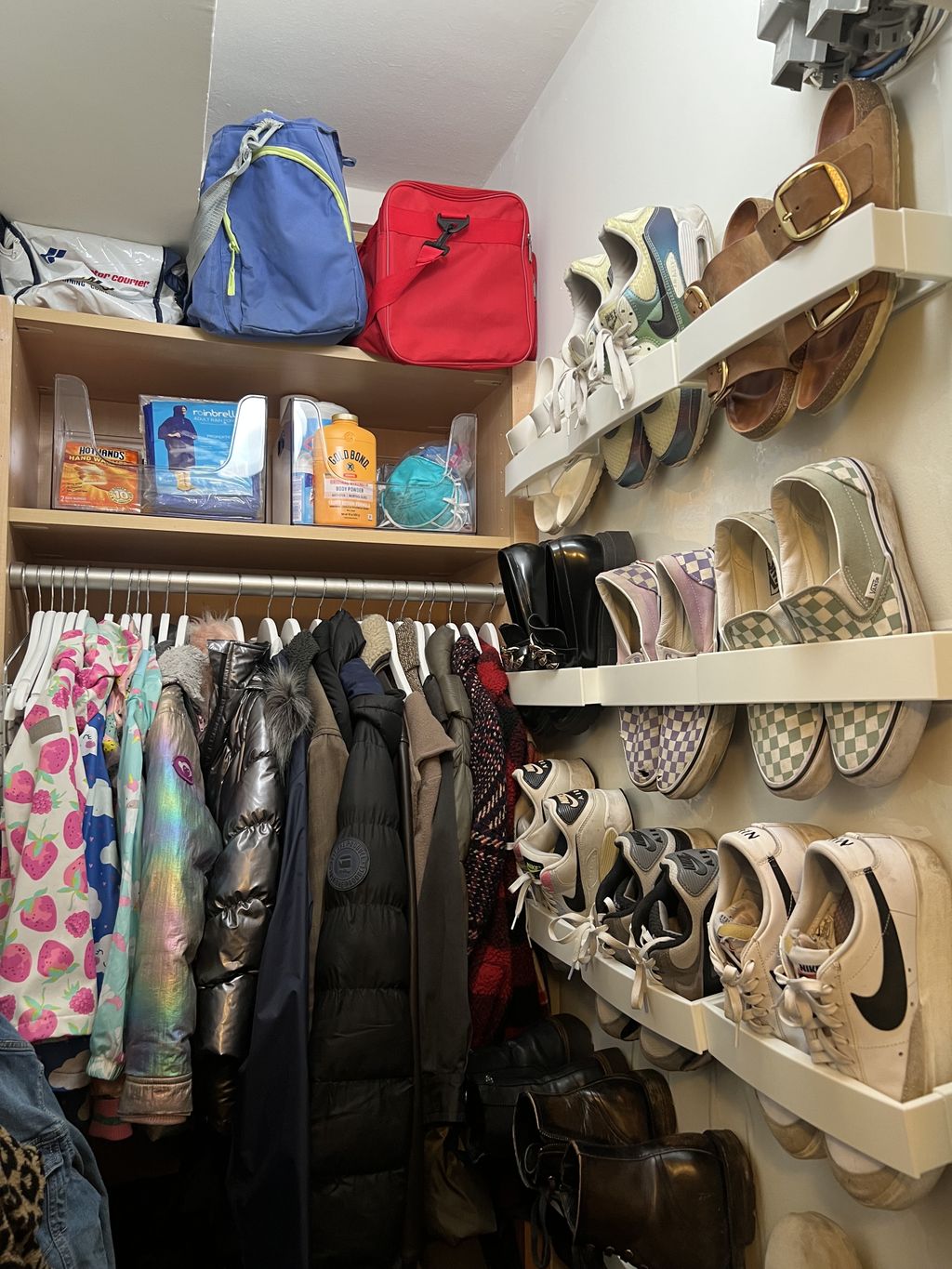Utilized unused wall space for vertical shoe stora