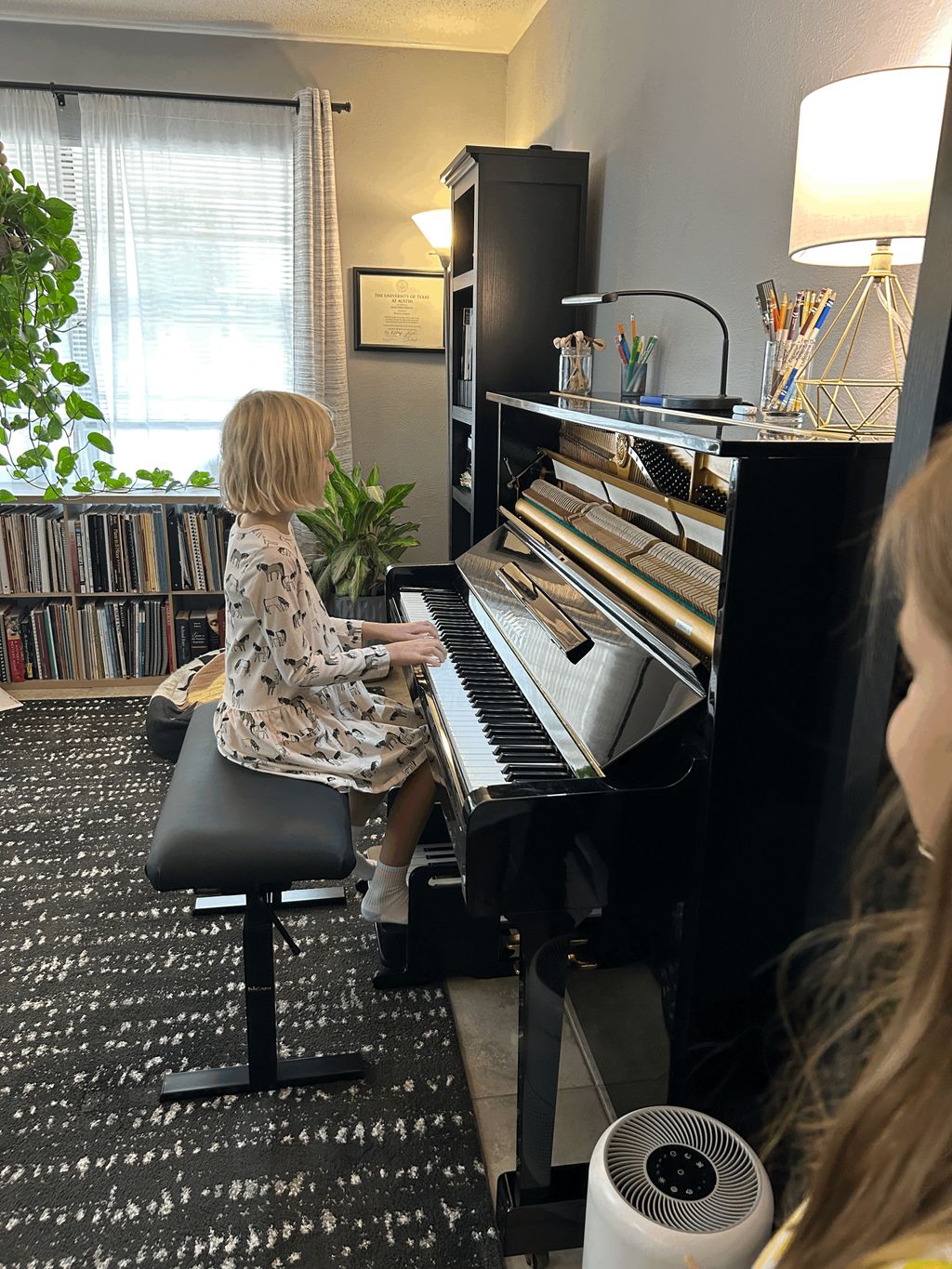 Having fun seeing inside of the piano!