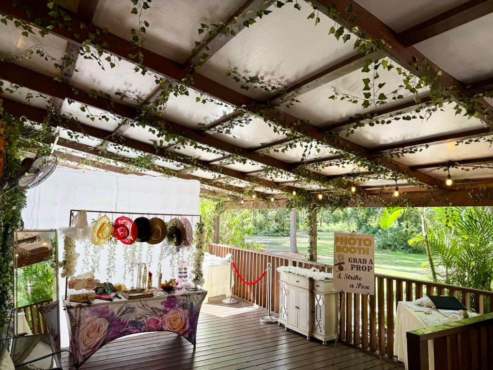 Staging for wedding w/enclosed booth & props/acces