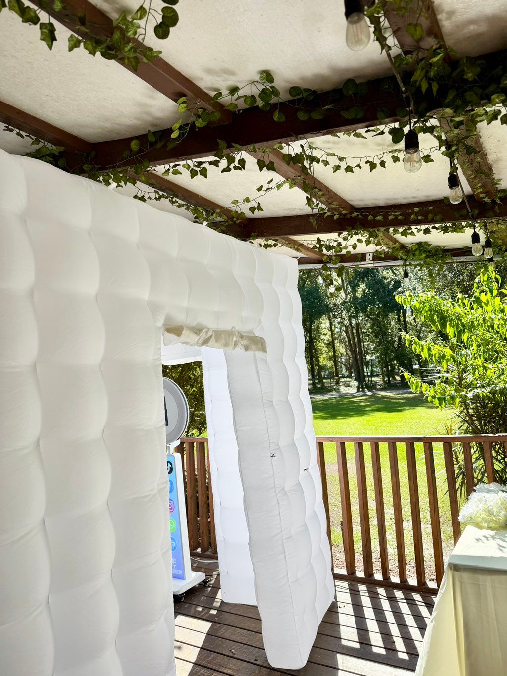 Enclosed photo booth w/lighting outside event 